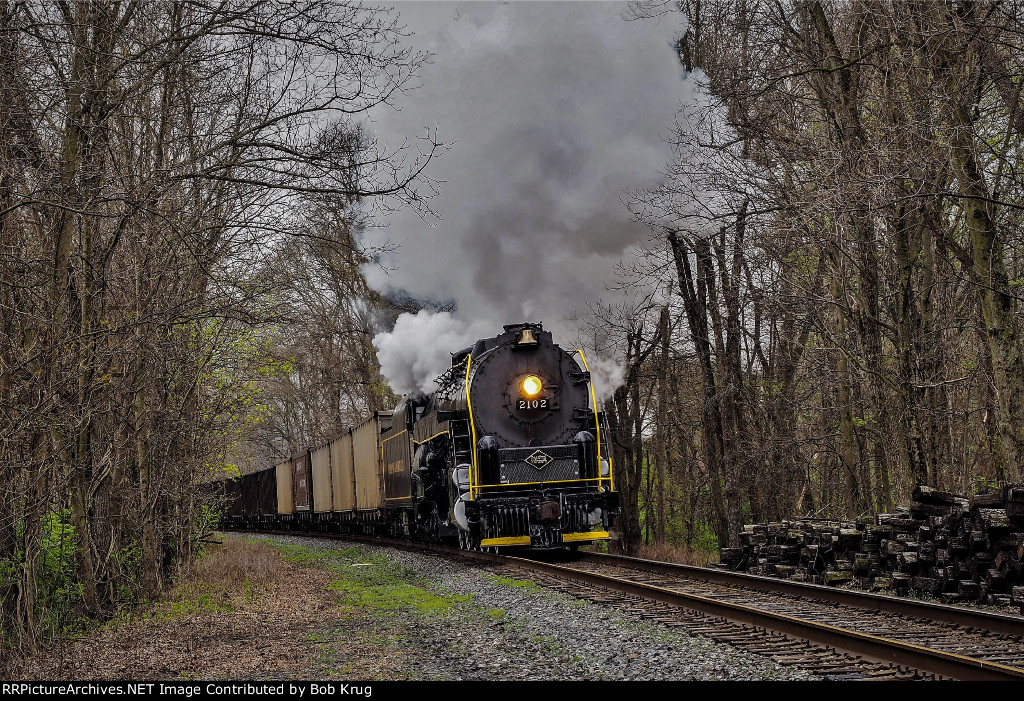 RBMN 2102 with a coal train at Fisher Dam Road grade crossing